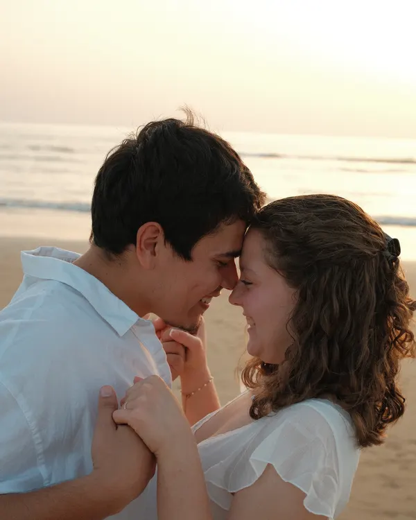 Couple embracing by the sea